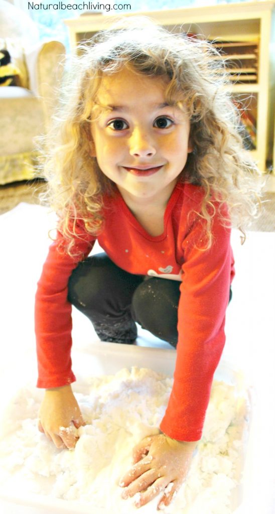 Easy to Make Homemade Snow Dough, ONLY 2 ingredients and it's just like real snow. DIY sensory play perfect for winter. Perfect for an Arctic Unit Study too