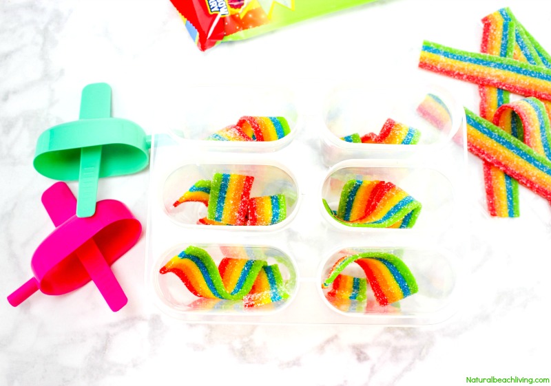 How to Make Fruit Juice Airhead Popsicles, Homemade Juice Popsicles perfect for a fun summer treat or Birthday party, Yummy Kids rainbow popsicle recipe