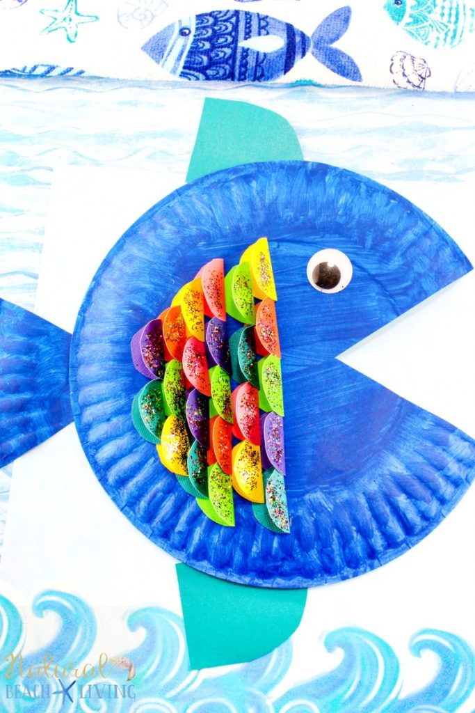 Learn how to make a colorful Paper Plate Fish Craft with a couple simple supplies. This easy craft is perfect for ocean theme activities and kids of all ages. Add this Rainbow Fish Craft for your Under the Sea Preschool Theme