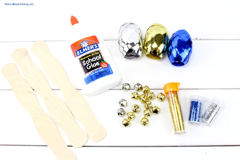 Easy New Years Eve DIY Noise Maker, How to Make DIY Spirit Noisemakers, homemade DIY noisemakers to make your New Year’s Party awesome, New Year's Eve DIY Noise Makers for kids, homemade loud noise makers, #Newyearsevecraft #noisemakers #Newyearseveparty