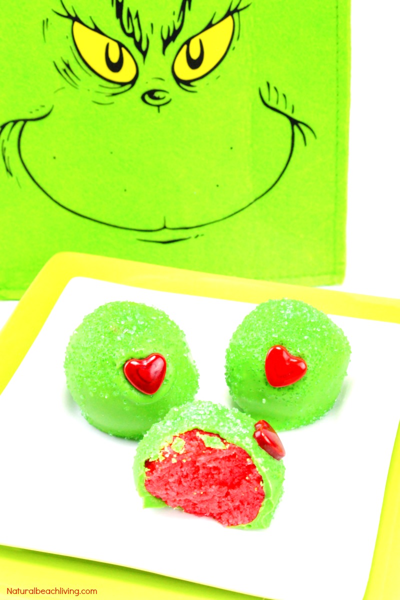  these Grinch Snacks are AMAZING! Not only are they the cutest bite size Christmas cake balls ever, but they also taste delicious too. Everyone loves Grinch Christmas treats
