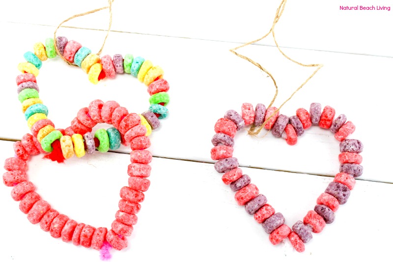 Easy Kid Made Bird Feeder Ornaments Everyone Loves, Heart Bird Treats, Heart bird feeder ornaments, Perfect Valentine's Day activity for kids, Easy Homemade Bird Feeder Ornaments, This is a great winter activity for kids, Birdseed ornaments, DIY Bird Feeder for kids to make, Nature activities for kids, How to Make Bird Treats, How to Make Bird Feeder Ornaments with Kids, Birdseed Ornaments Recipe #birdseedornaments #Birdtreats #homemadebirdfeeders #birds #bird