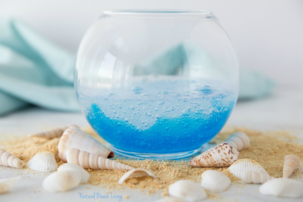 Ocean Slime With The Best Clear Slime Recipe, Whether you are looking for a fun summer activity, a cool centerpiece for an ocean theme party, a slime party favor or a super cool slime gift idea this Ocean Slime is perfect! Clear Ocean Slime, Under the Sea Slime Recipe, How to Make Clear Slime, slime recipes, Slime Supplies, Slime Gift Ideas #slime #slimerecipes #clearslime #oceanslime #oceantheme #underthesea Ocean Slime With The Best Clear Slime Recipe, Whether you are looking for a fun summer activity, a cool centerpiece for an ocean theme party, a slime party favor or a super cool slime gift idea this Ocean Slime is perfect! Clear Ocean Slime, Under the Sea Slime Recipe, How to Make Clear Slime, slime recipes, Slime Supplies, Slime Gift Ideas