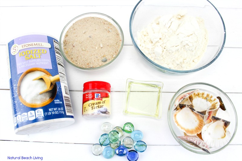 Kids love making imprints of the seashells on this sand playdough. Make DIY Sand Play dough for a perfect Beach Theme Playdough recipe, this Textured Playdough is fun sensory play and summer activity #sensoryplay #playdough #sandplaydough #preschool #toddlers #beachtheme Kids love making imprints of the seashells on this sand playdough. Make DIY Sand Play dough for a perfect Beach Theme Playdough recipe, this Textured Playdough is fun sensory play and summer activity