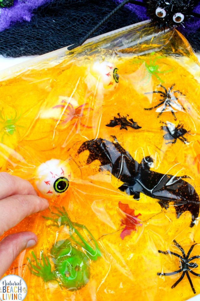 An easy Halloween Sensory Bag, Sensory play for babies, toddlers, and preschoolers, The Benefits of sensory Bags and How to Make Halloween Sensory Bags, Mess Free Halloween Sensory Activities for exploring senses. Sensory Play for Babies