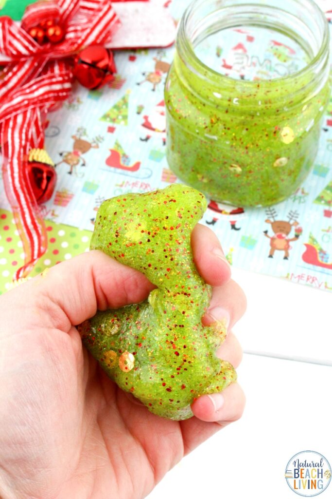 You're going to have so much fun creating this Christmas slime! It's easy to make and even more fun to create and play with! Grinch Slime is a Super Sensory Activity and a Christmas Craft and Science idea all kids love. Add this to a Grinch Party or make this Easy Slime Recipe with your kids. 