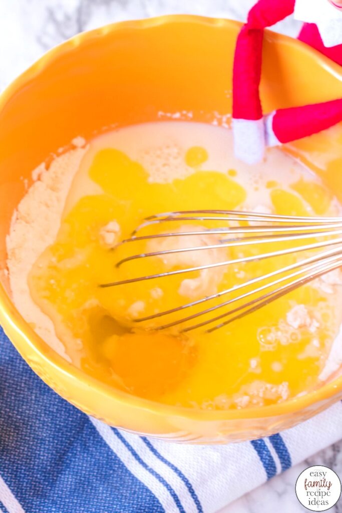 You're going to love this Elf on the Shelf Pancake Breakfast! It's a fun recipe that gets everyone cooking together in the kitchen! There isn't much better than eating Christmas pancakes? make homemade pancakes with your children to add fun and magic of the elf on the shelf. This Elf on the Shelf ideas will make your whole family happy.