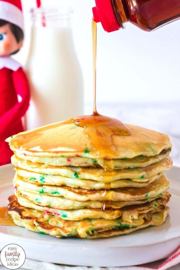 You're going to love this Elf on the Shelf Pancake Breakfast! It's a fun recipe that gets everyone cooking together in the kitchen! There isn't much better than eating Christmas pancakes? make homemade pancakes with your children to add fun and magic of the elf on the shelf. This Elf on the Shelf ideas will make your whole family happy.