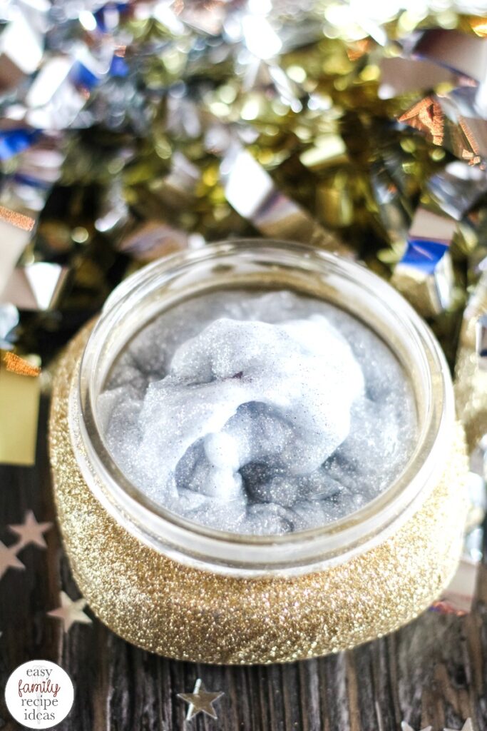 You're going to love the ease of this New Years Eve Slime! It's a simple clear slime recipe that will have everyone celebrating in the New Year fun!  Plus, your children can create a fun Glitter Craft Jar to put their slime in. This DIY slime recipe makes the Perfect Party Slime! 