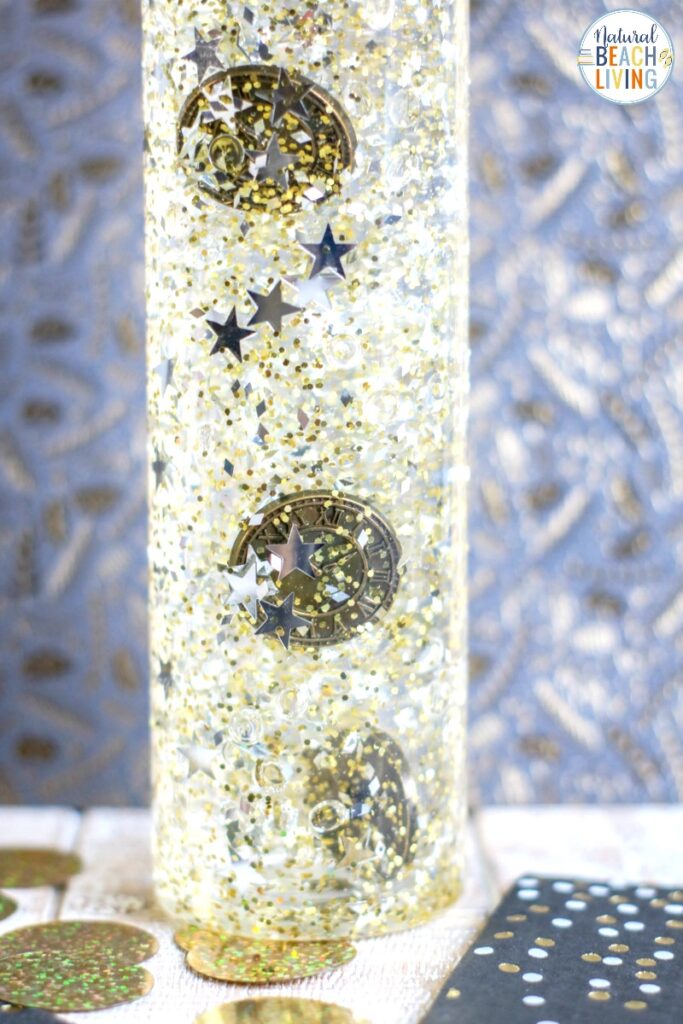 Consider making this New Year's Sensory Bottle this year for your child. It's an easy sensory bottle that is certain to provide them with tons of calming sensory play. These New Year's Eve Activities for preschoolers and Winter Sensory Bottles are so much fun, Find Sensory Bottles for Holidays and a variety of themes Here. 