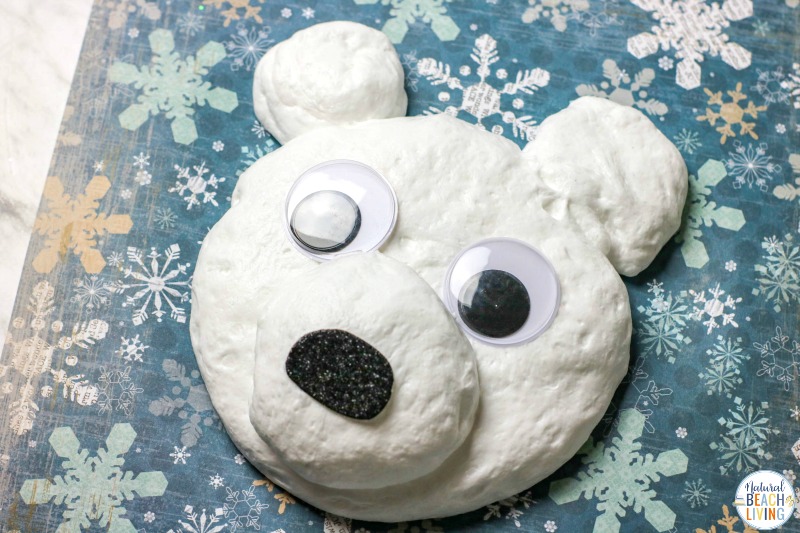 This Polar Bear Fluffy Slime is easy to make and It's a great winter indoor activity that encourages imagination and a fun sensory activity. This Snow Slime is just the cutest snow slime recipe, ever. Make this Fluffy Slime Recipe to add to a Winter Preschool Theme. Fun Polar Bear Craft