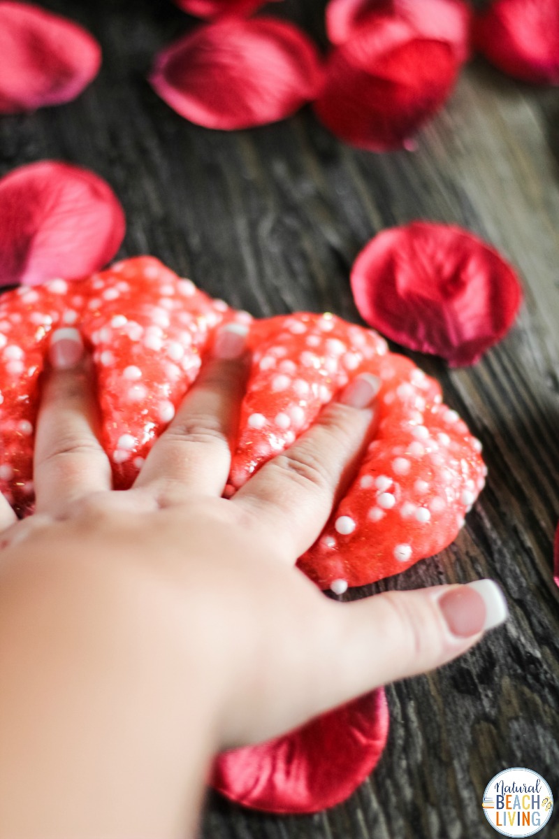 This Valentines Day Slime Card is so simple and easy to make. Plus, it's a unique Valentines Day Slime Recipe and easy Valentine Crafts for Preschoolers. This Valentine's Day Floam Slime is an awesome sensory activity and a super cool Kid Valentine Card, Use this Valentine Craft idea for a Preschool Valentine Theme Kids Love!