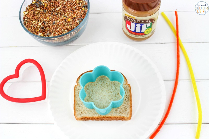 These peanut butter bird treats are so much fun to make. Plus, the birds love them! With just 3 simple ingredients needed, these are so easy to make! The best thing about these bird seed ornaments is it's kid-friendly.