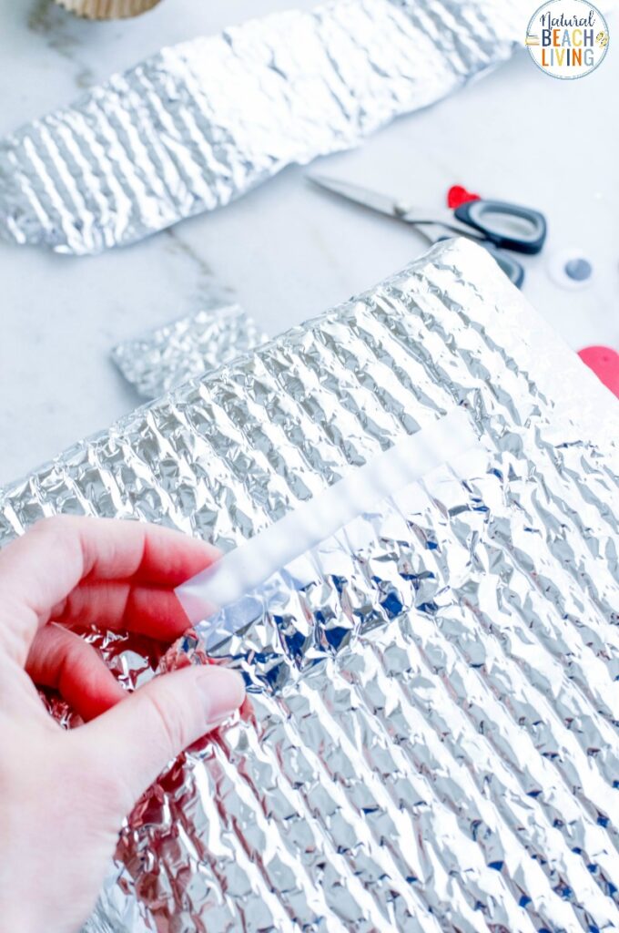 This Robot Valentine Box is so much fun! A super cute Valentine's Day Card Box that you can easily make with recycled materials? Your kids will love this DIY Robot Valentine Box, Gather up your supplies and get ready to have fun creating this DIY robot!