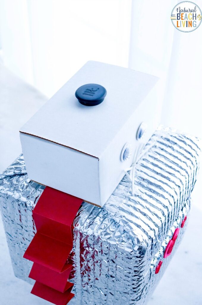 This Robot Valentine Box is so much fun! A super cute Valentine's Day Card Box that you can easily make with recycled materials? Your kids will love this DIY Robot Valentine Box, Gather up your supplies and get ready to have fun creating this DIY robot!