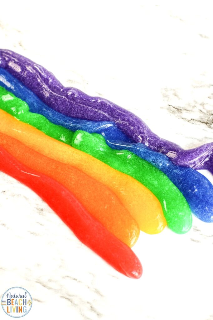 This Rainbow Slime is so much fun to make! This Rainbow Slime Recipe with Contact Solution is bright, stretchy, and amazing. Your child is going to love playing with this Easy Slime Recipe. Make this slime for a fun spring or summer activity or a unicorn or rainbow theme birthday party. It's Perfect! 