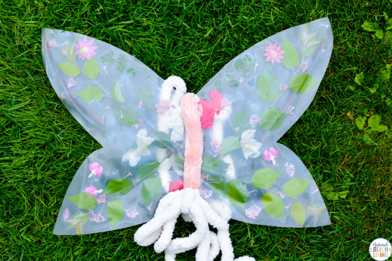 Lovely Flower Butterfly Wings for a DIY Flower Fairy Craft; This is THE BEST Nature Craft, How to make your own DIY butterfly wings for kids from flowers, A fun and easy DIY Flower Fairy Craft for kids. Perfect for Forest School or even a DIY Halloween Costume.