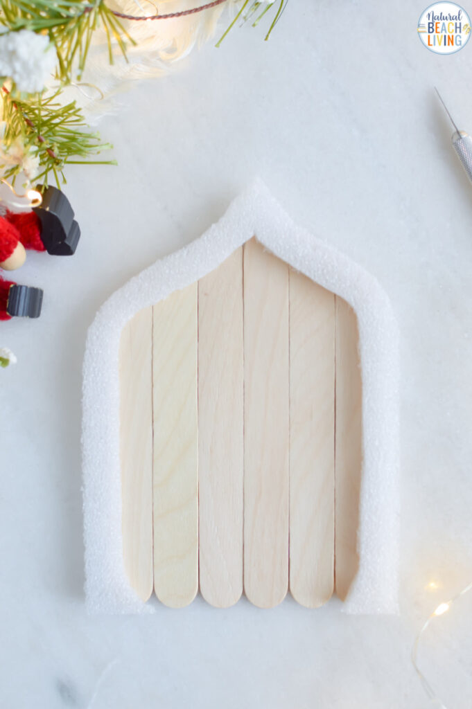 DIY Christmas Elf Door, This is a fun Christmas Craft Idea you can do with kids, in a group, or as an adult Christmas craft. Try out these magical elf ideas, kind elf ideas, and elf on the shelf ideas for your Christmas fun.