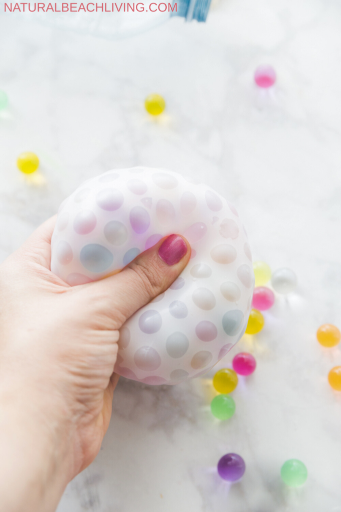Discover how to make the best Orbeez stress balls for sensory play and stress relief. Easy, fun, and cheap, these cool stress balls are loved by everyone! See How to Make Stress Balls with only 2 supplies.