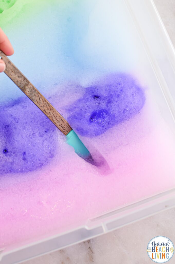 Make magical rainbow soap foam with kids! This easy homemade sensory play recipe is perfect for toddlers & preschoolers. Simple, fun & colorful!
