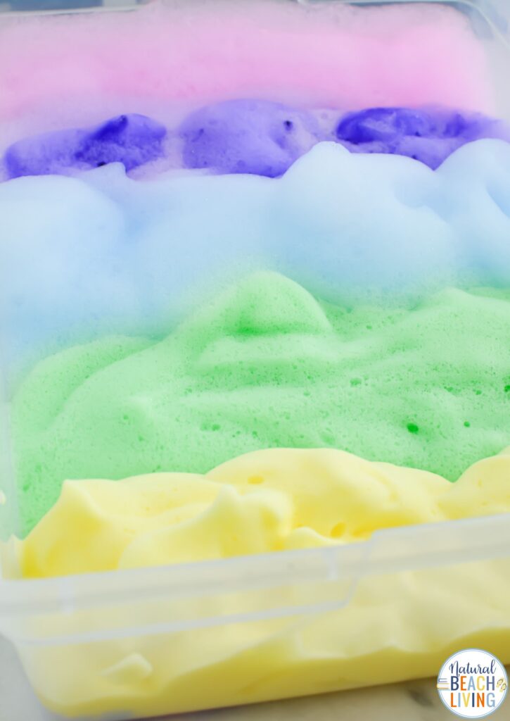 Create stunning rainbow soap foam for kids! This easy homemade recipe is the perfect sensory play activity for toddlers and preschoolers!