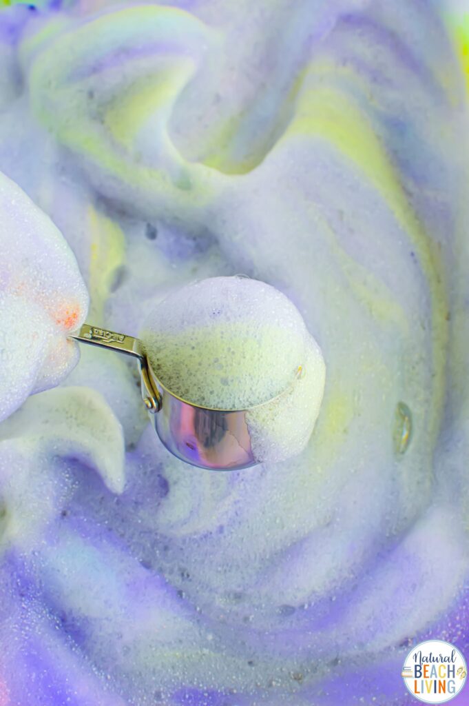 Make magical rainbow soap foam with kids! This easy homemade sensory play recipe is perfect for toddlers & preschoolers. Simple, fun & colorful!